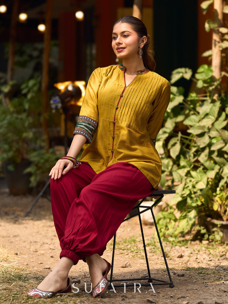 Mustard Cotton Silk Top With Pleated Yoke And Contrasting Ikat Detailing On Sleeves And Collar