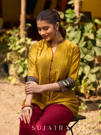 Mustard Cotton Silk Top With Pleated Yoke And Contrasting Ikat Detailing On Sleeves And Collar