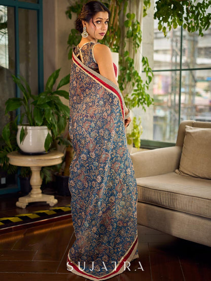 Flourishing Ivory Kalamkari Floral Chanderi Saree with Red Zari-Trimmed Hem & Chevron Border Accent