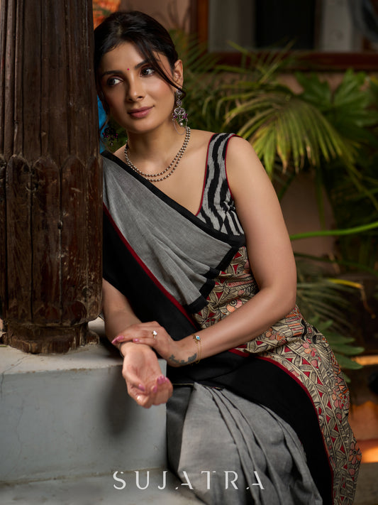 Sophisticated grey cotton saree with bold Madhubani artistry and timeless allure