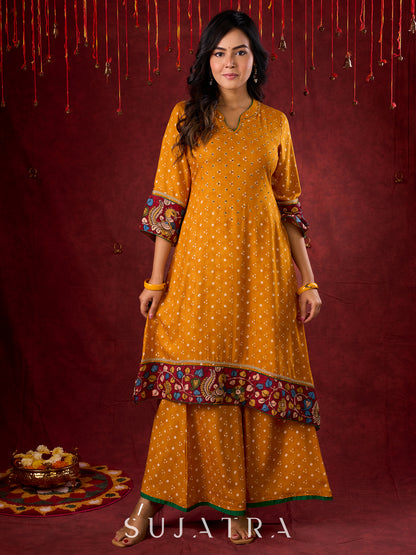 Marigold Yellow Bandhani Asymmetrical Kurta with Kalamkari Accents and Minimal Embellishments