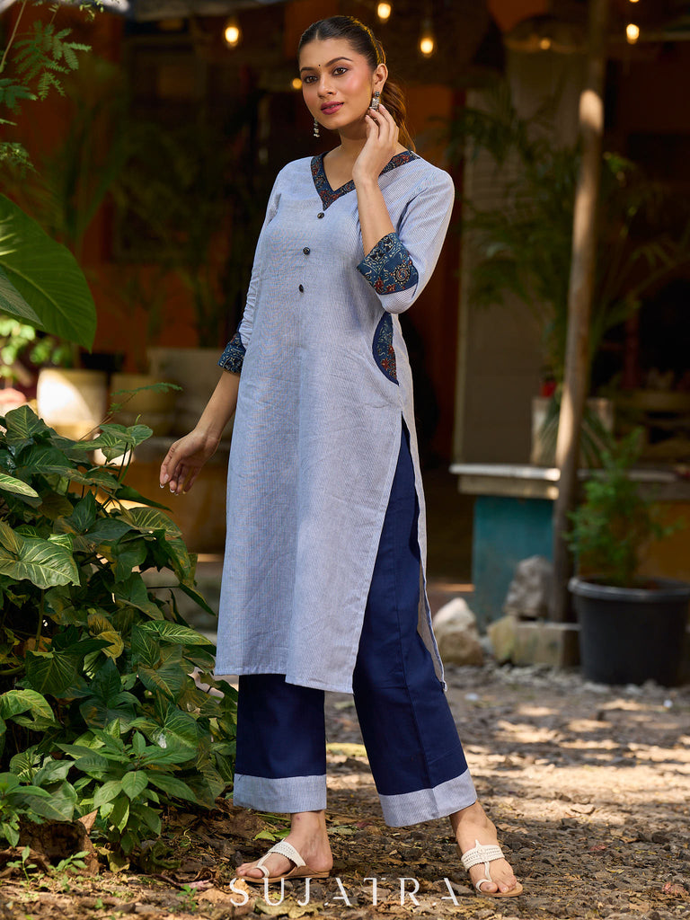 chic blue striped kurta adorned with peeking ajrakh accents on the pocket and sleeves.