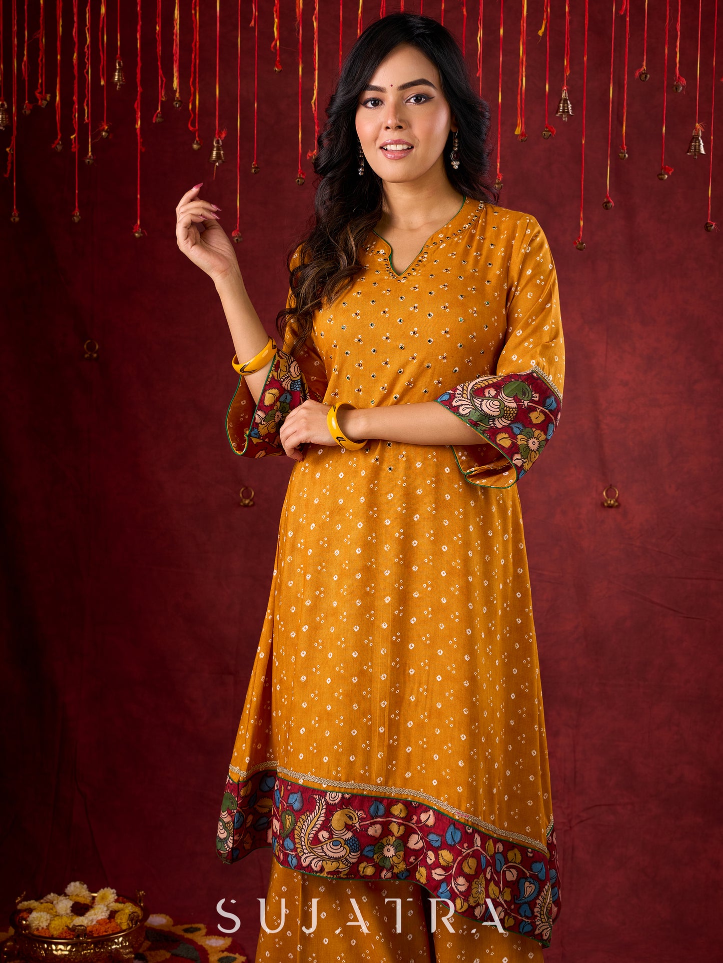 Marigold Yellow Bandhani Asymmetrical Kurta with Kalamkari Accents and Minimal Embellishments