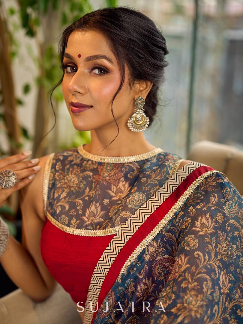 Flourishing Ivory Kalamkari Floral Chanderi Saree with Red Zari-Trimmed Hem & Chevron Border Accent
