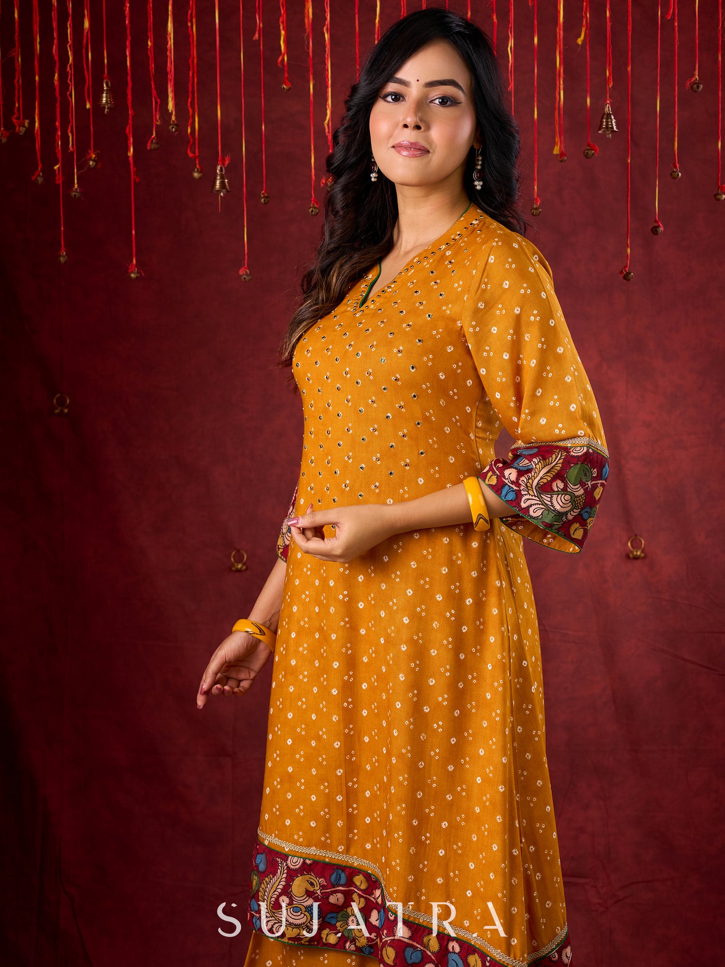 Marigold Yellow Bandhani Asymmetrical Kurta with Kalamkari Accents and Minimal Embellishments