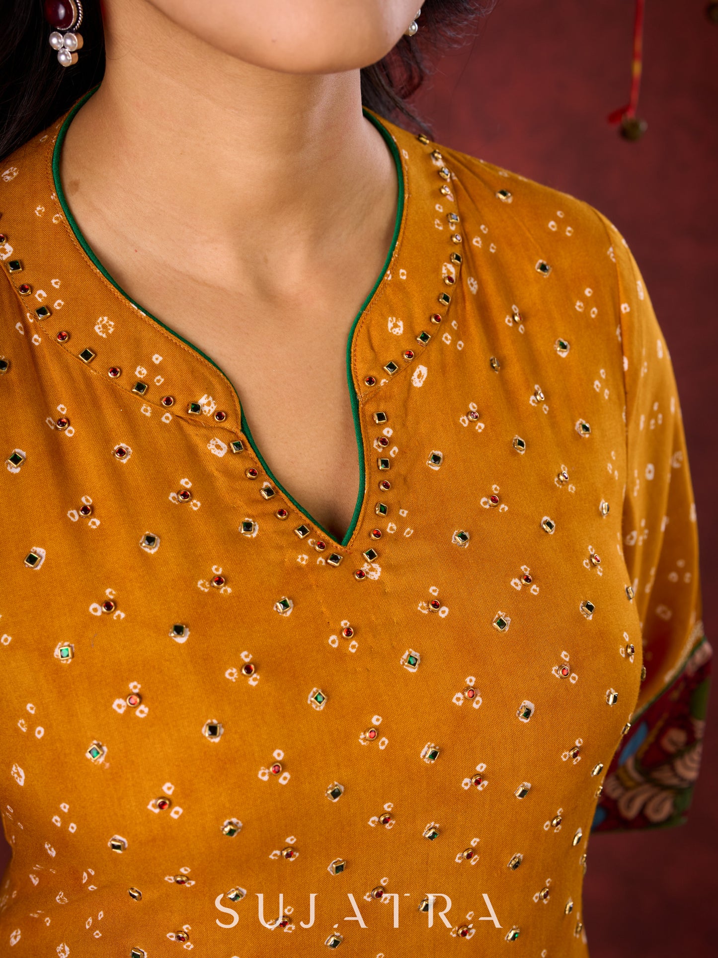 Marigold Yellow Bandhani Asymmetrical Kurta with Kalamkari Accents and Minimal Embellishments