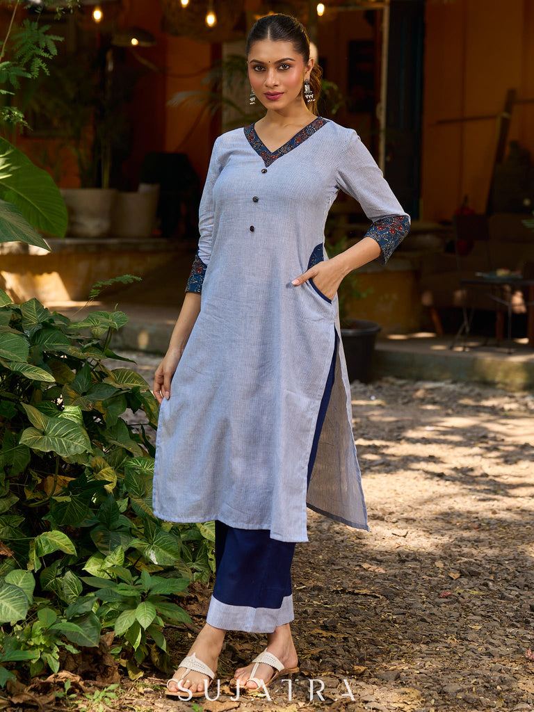 chic blue striped kurta adorned with peeking ajrakh accents on the pocket and sleeves.