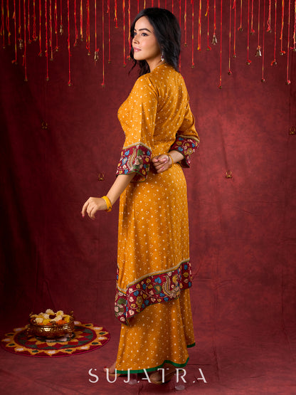 Marigold Yellow Bandhani Asymmetrical Kurta with Kalamkari Accents and Minimal Embellishments