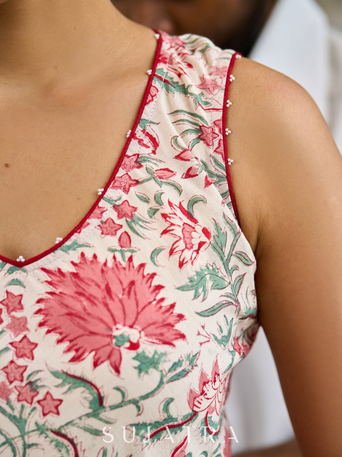 Dussehra Sale — Wistful White Sleeveless Cotton Printed Floral Dress with Delicate Bead Embellishments and Contrast Maroon Piping