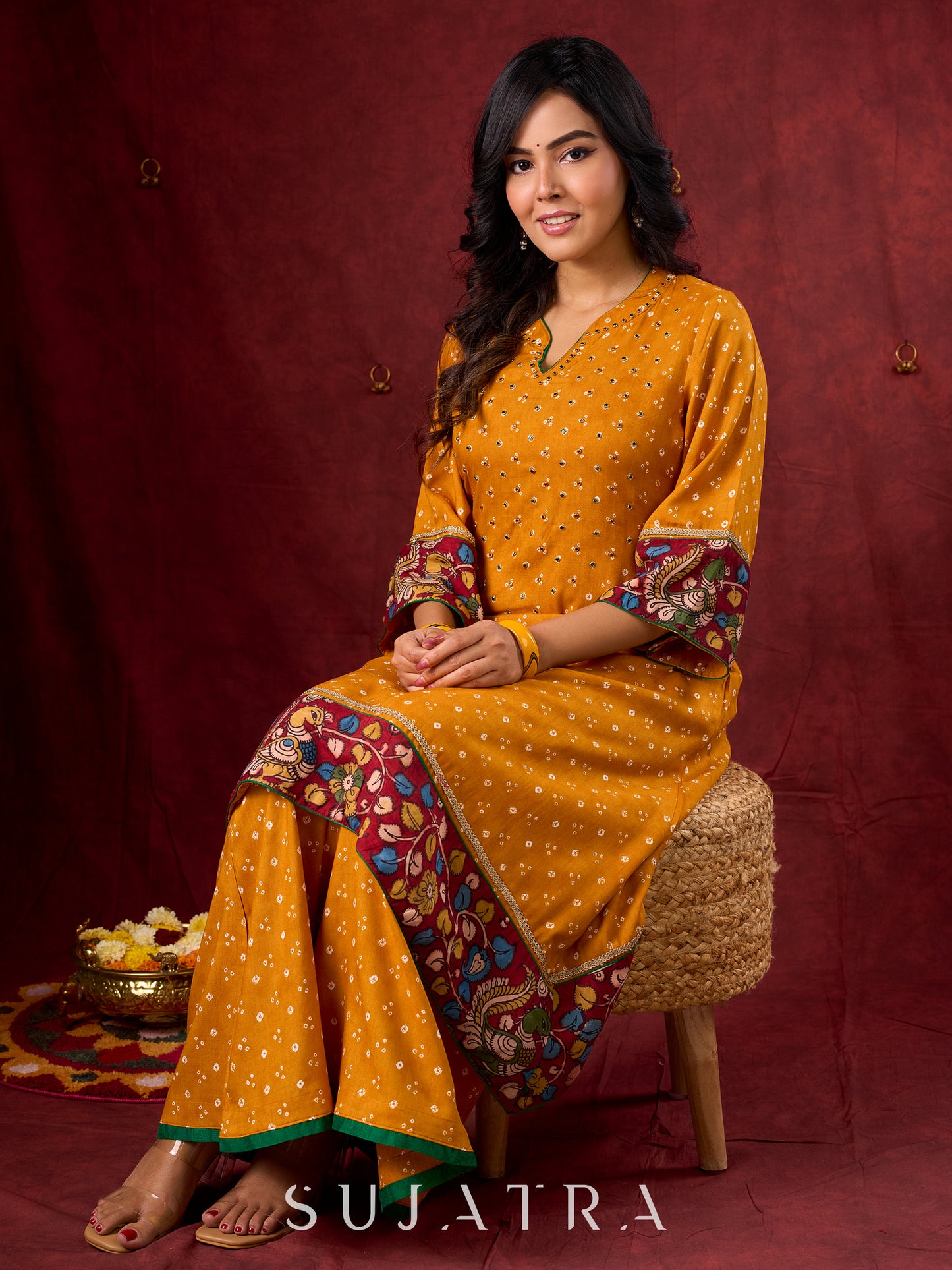 Marigold Yellow Bandhani Asymmetrical Kurta with Kalamkari Accents and Minimal Embellishments