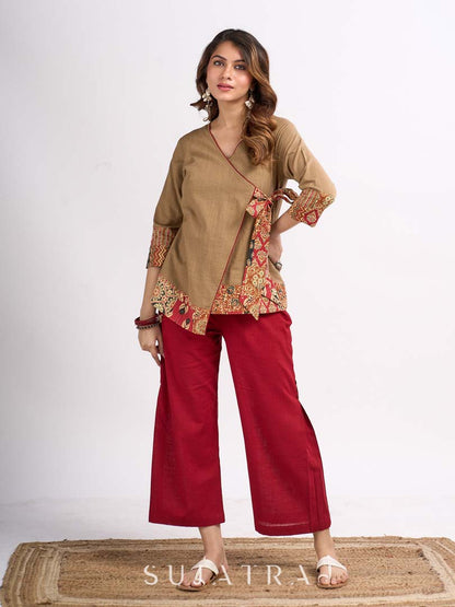 Beige Cotton Angrakha Style Top with Contrast Piping and Statement Tie Up Detailing