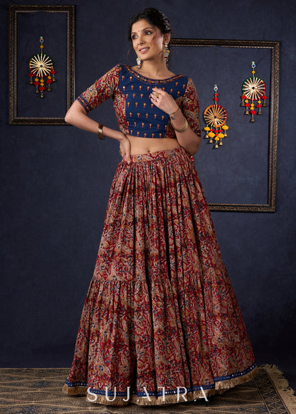 Evergreen Kalamkari Lehenga With Navy Blue Embroidered Blouse & Matching Dupatta.