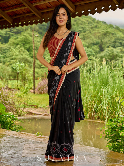 Heritage black cotton saree blending Jamdani-inspired weaves with Ajrakh elegance