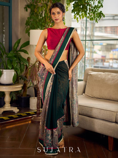 Regal Bottle Green Georgette Saree with Artistic Kalamkari Printed Pallu & Delicate Gold Lace Border