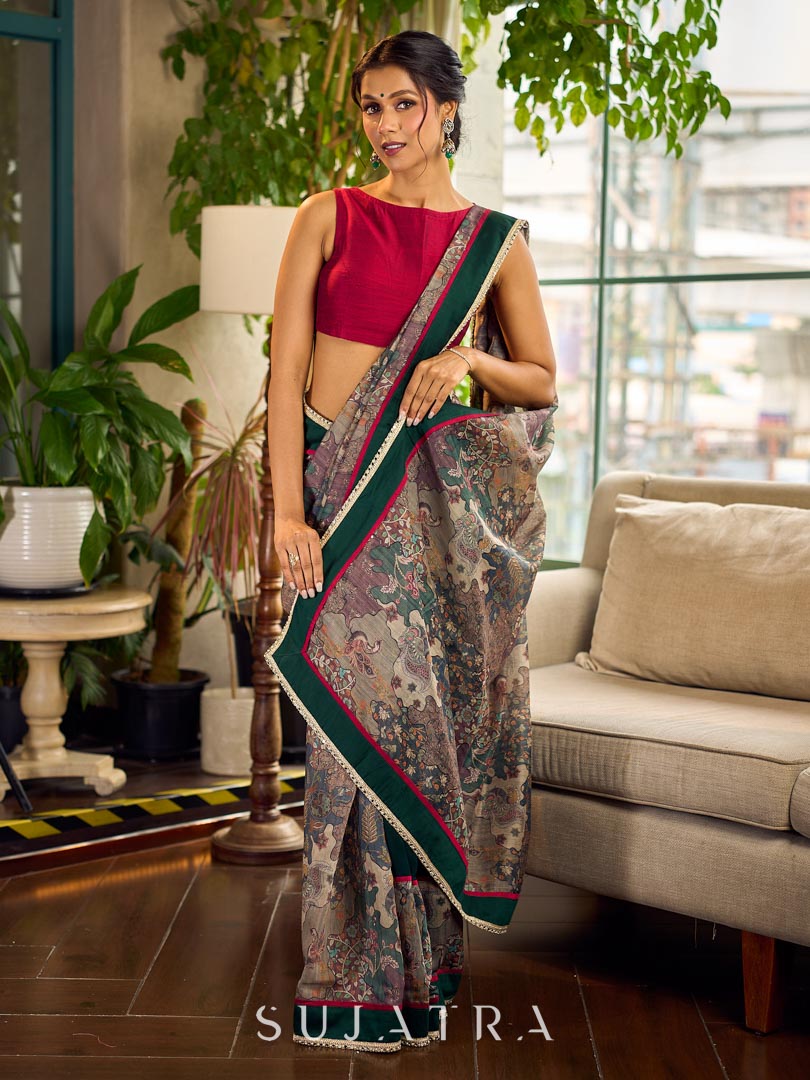 Regal Bottle Green Georgette Saree with Artistic Kalamkari Printed Pallu & Delicate Gold Lace Border