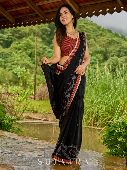 Heritage black cotton saree blending Jamdani-inspired weaves with Ajrakh elegance