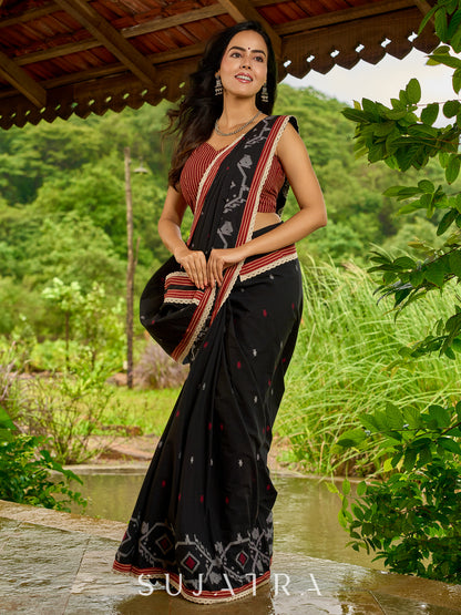Heritage black cotton saree blending Jamdani-inspired weaves with Ajrakh elegance