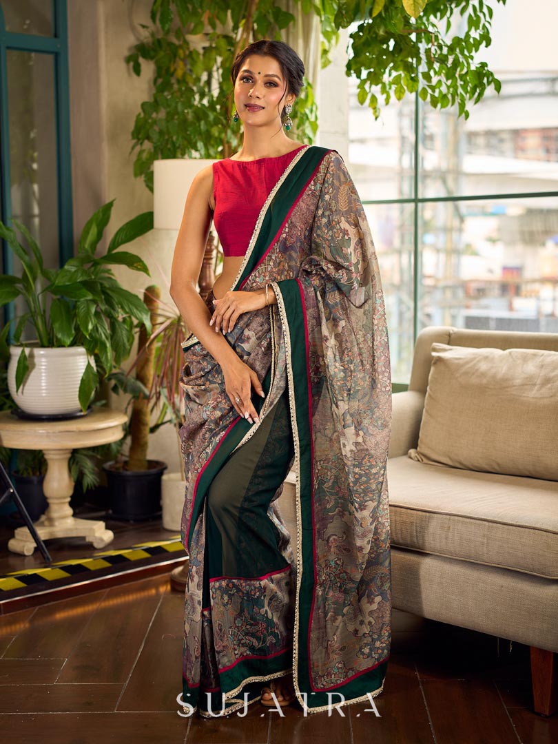 Regal Bottle Green Georgette Saree with Artistic Kalamkari Printed Pallu & Delicate Gold Lace Border