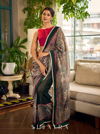 Regal Bottle Green Georgette Saree with Artistic Kalamkari Printed Pallu & Delicate Gold Lace Border