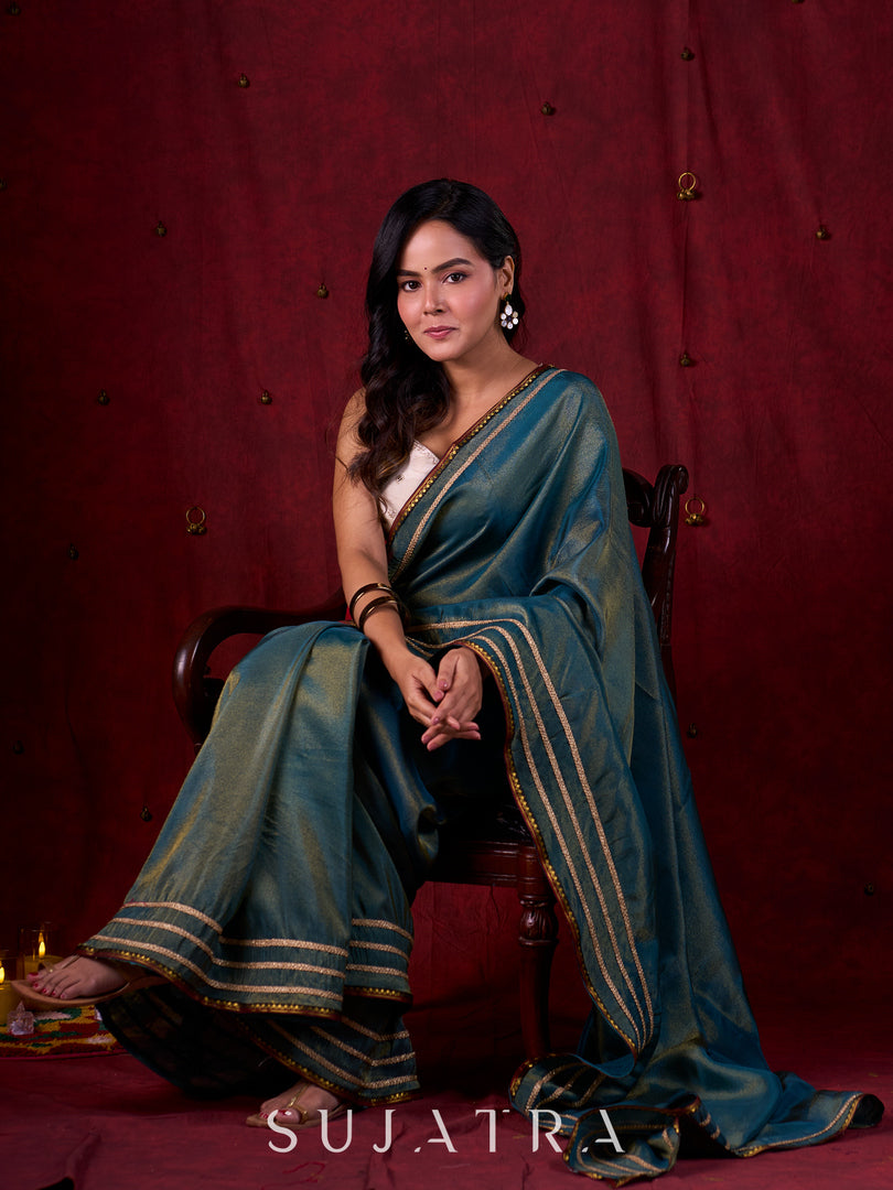 Teal Blue Tissue Saree with Zari Border & Minimal Detailing