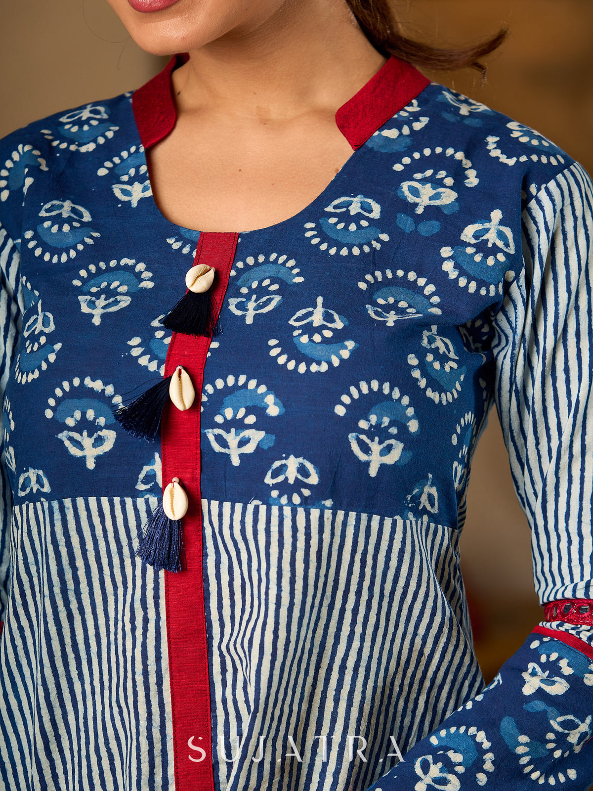 Indigo Cotton Top With Maroon Placket Detailed With Cowrie And Tassels, Finished with Collared Neckline