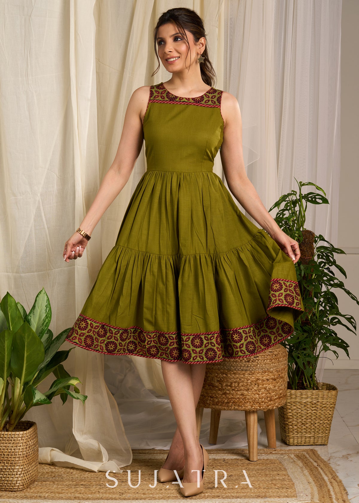 Dussehra Sale — Elegant olive cotton dress featuring intricate block printed border