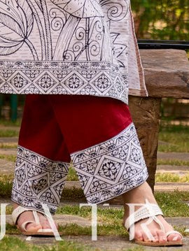 Timeless maroon pants elevated with a classic Madhubani border detail