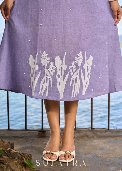 Trendy lavender cotton halter neck dress highlighted with floral embroidery