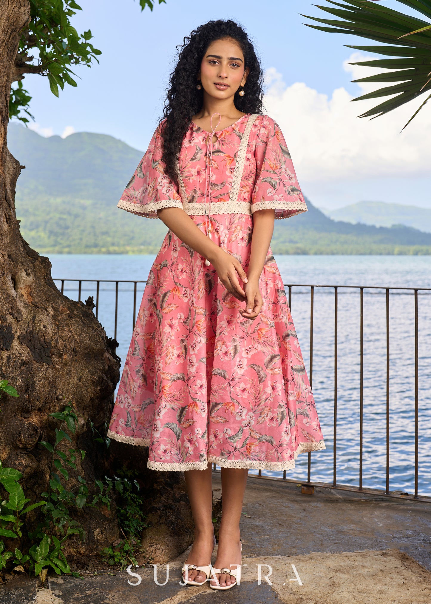 Beautiful light pink chanderi floral printed dress highlighted with macrame lace