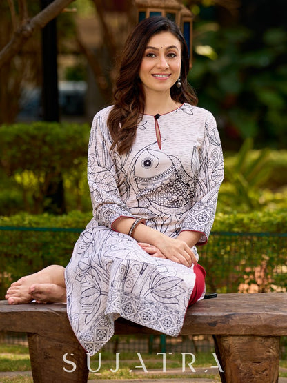 Elegant off-white and black kurta featuring Madhubani fish motifs with rich maroon accents