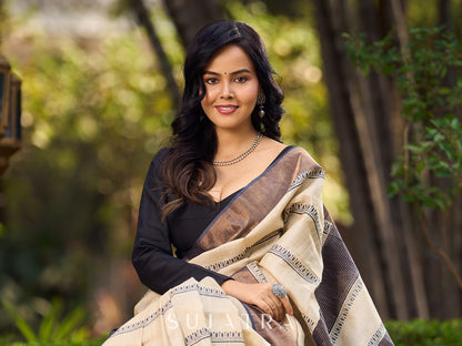 Timeless Ivory Tussar Saree with Subtle Stripes & Handcrafted Detailing