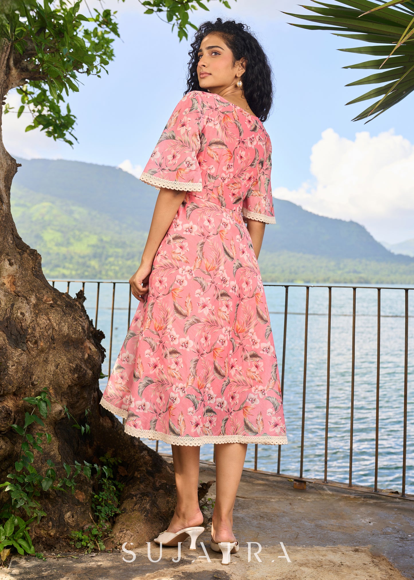 Beautiful light pink chanderi floral printed dress highlighted with macrame lace