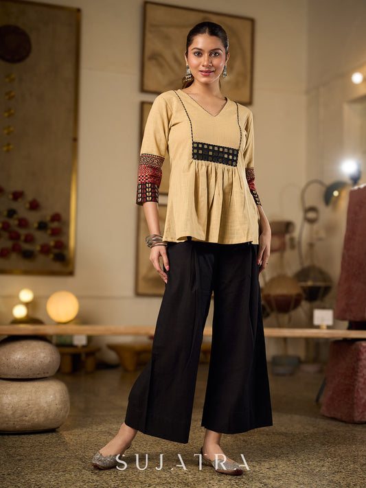 Chic Beige Cotton Top Enhanced With Ajrakh Print Sleeves & Embellished Kutch Mirror Work Yoke