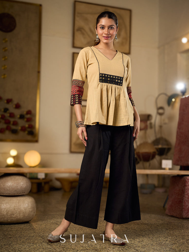 Chic Beige Cotton Top Enhanced With Ajrakh Print Sleeves & Embellished Kutch Mirror Work Yoke