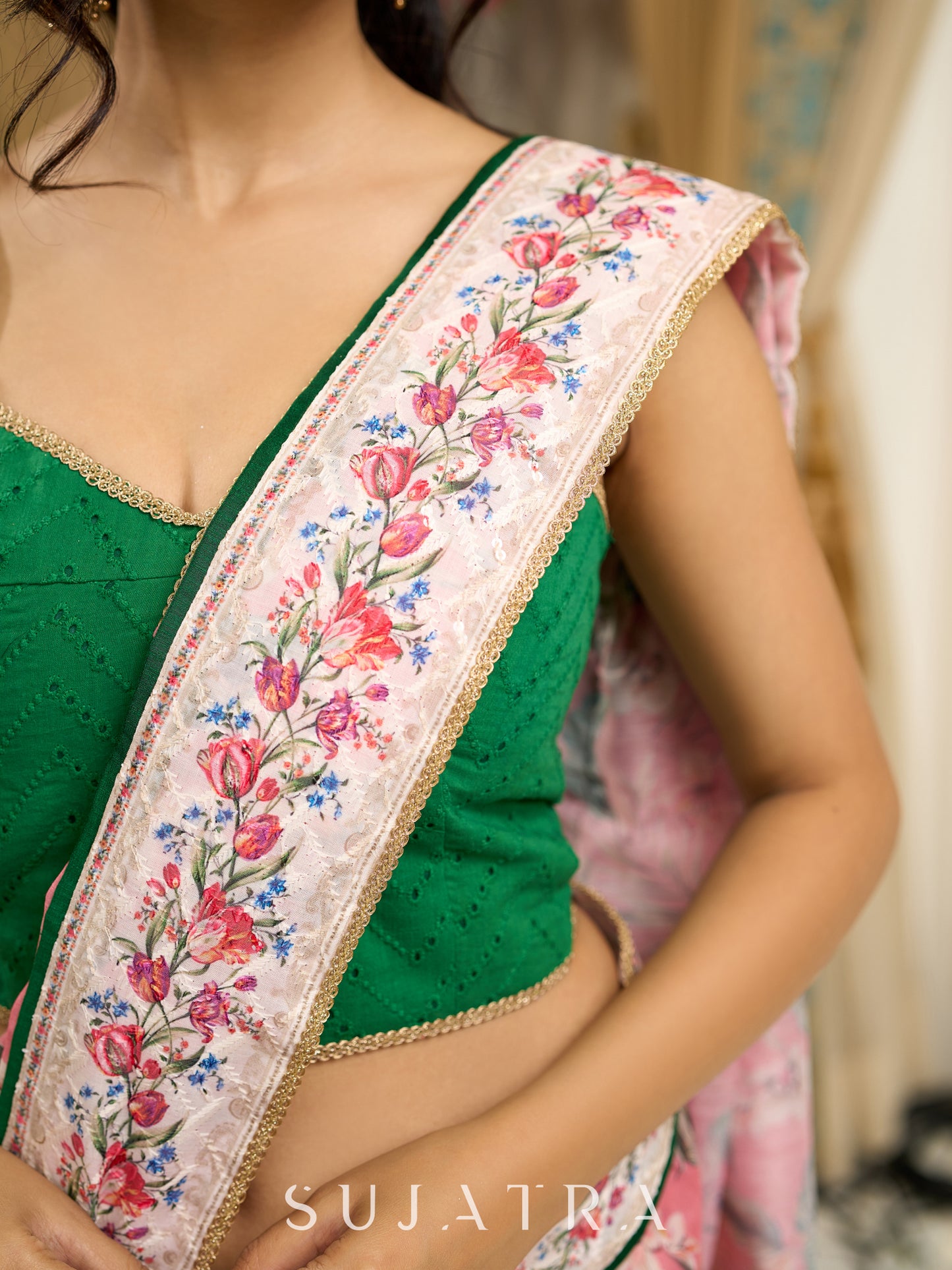 Blush pink floral fantasy chanderi saree draped with embroidered border