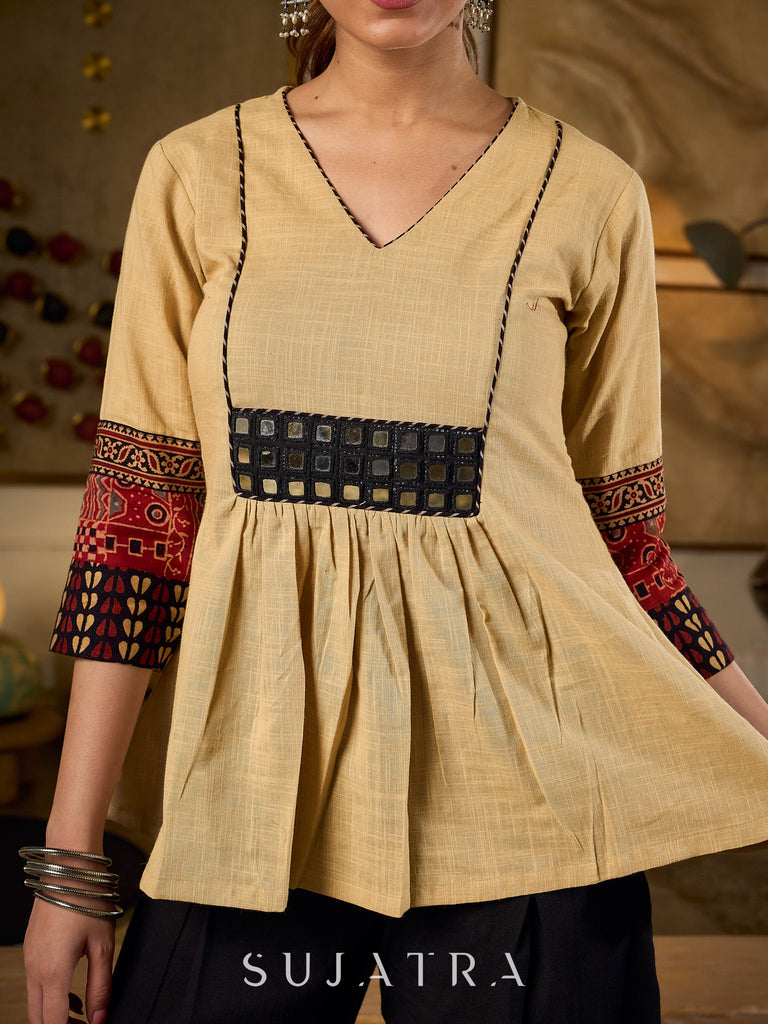 Chic Beige Cotton Top Enhanced With Ajrakh Print Sleeves & Embellished Kutch Mirror Work Yoke