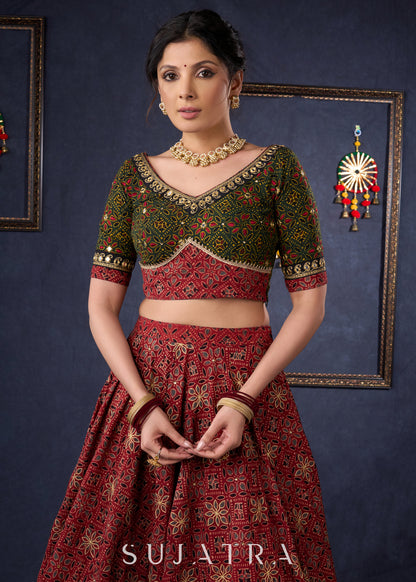 Green & Maroon Ajrakh Mix & Match Lehenga With All Over Embroidery & Contrast Dupatta.