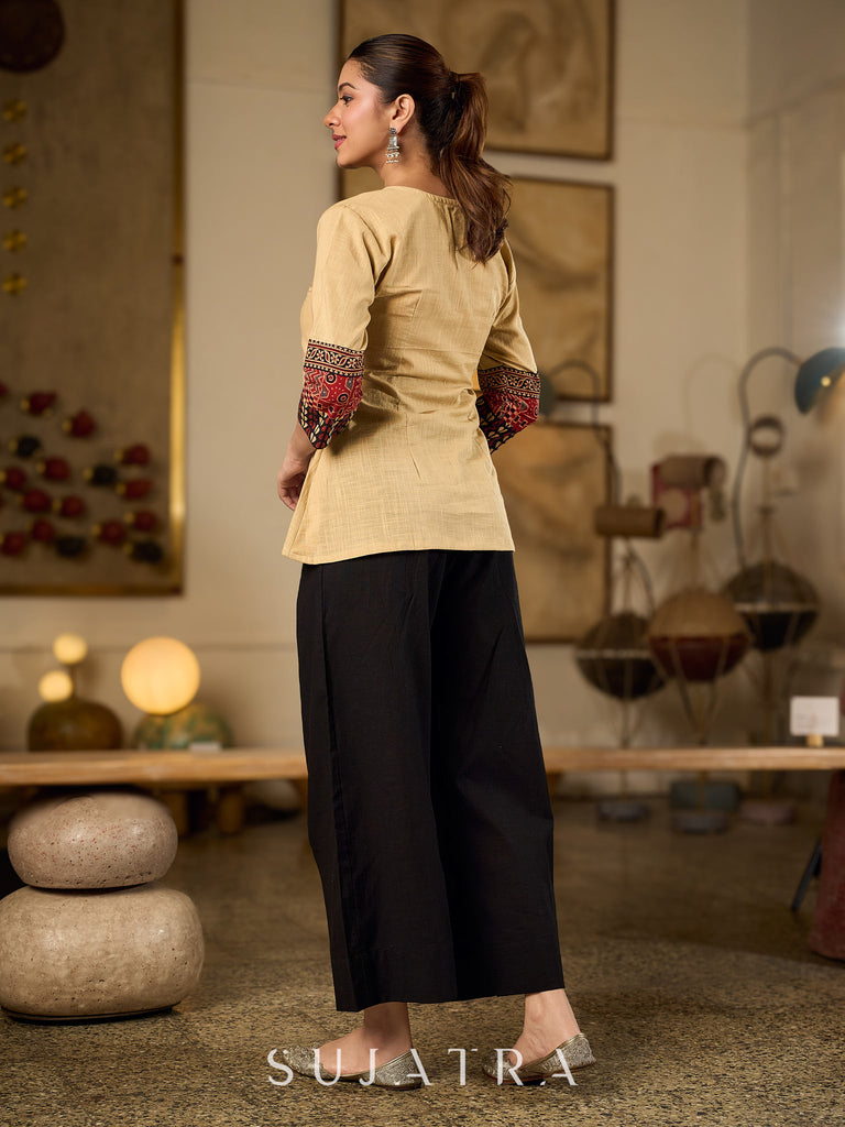 Chic Beige Cotton Top Enhanced With Ajrakh Print Sleeves & Embellished Kutch Mirror Work Yoke