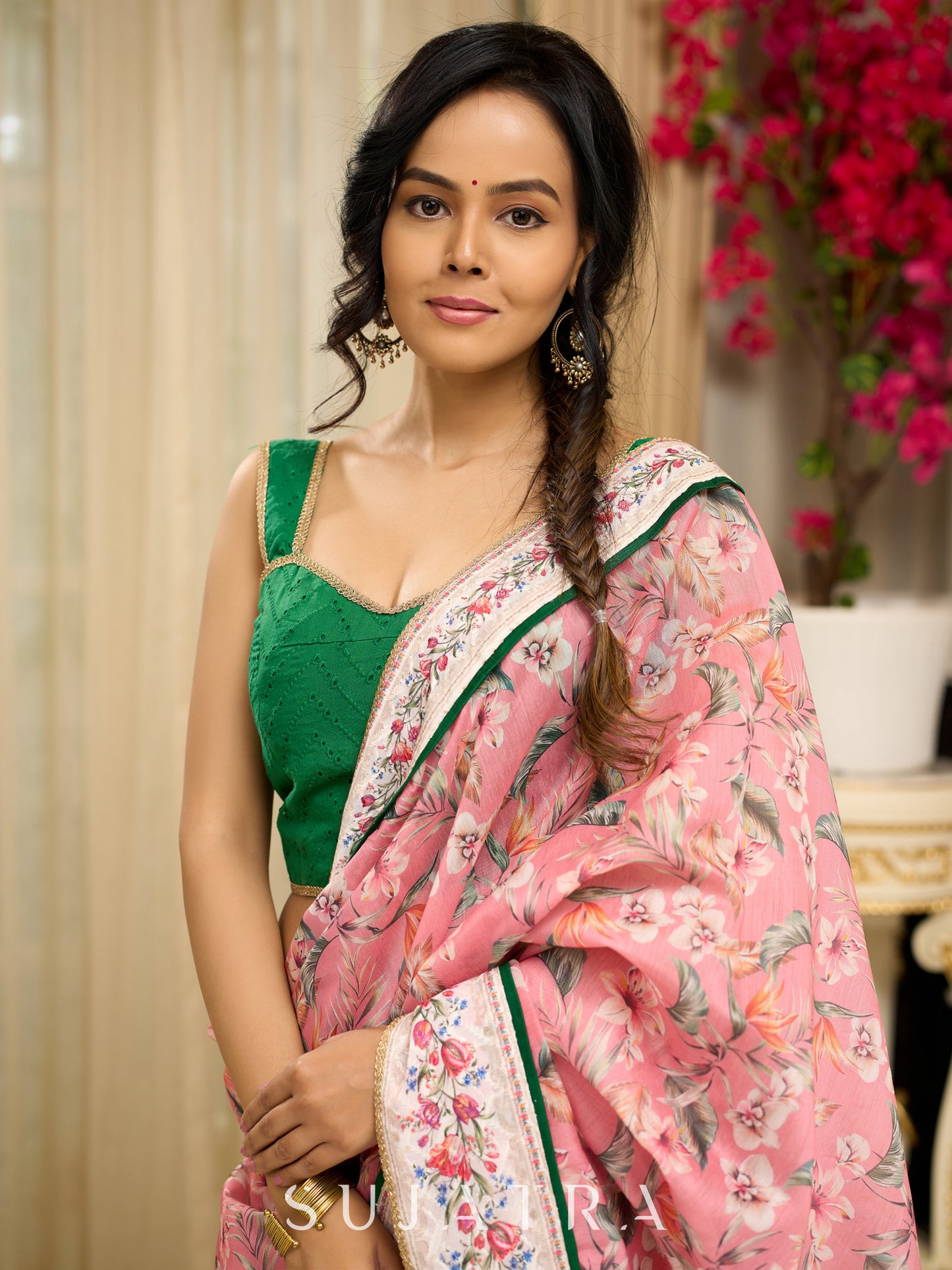 Blush pink floral fantasy chanderi saree draped with embroidered border