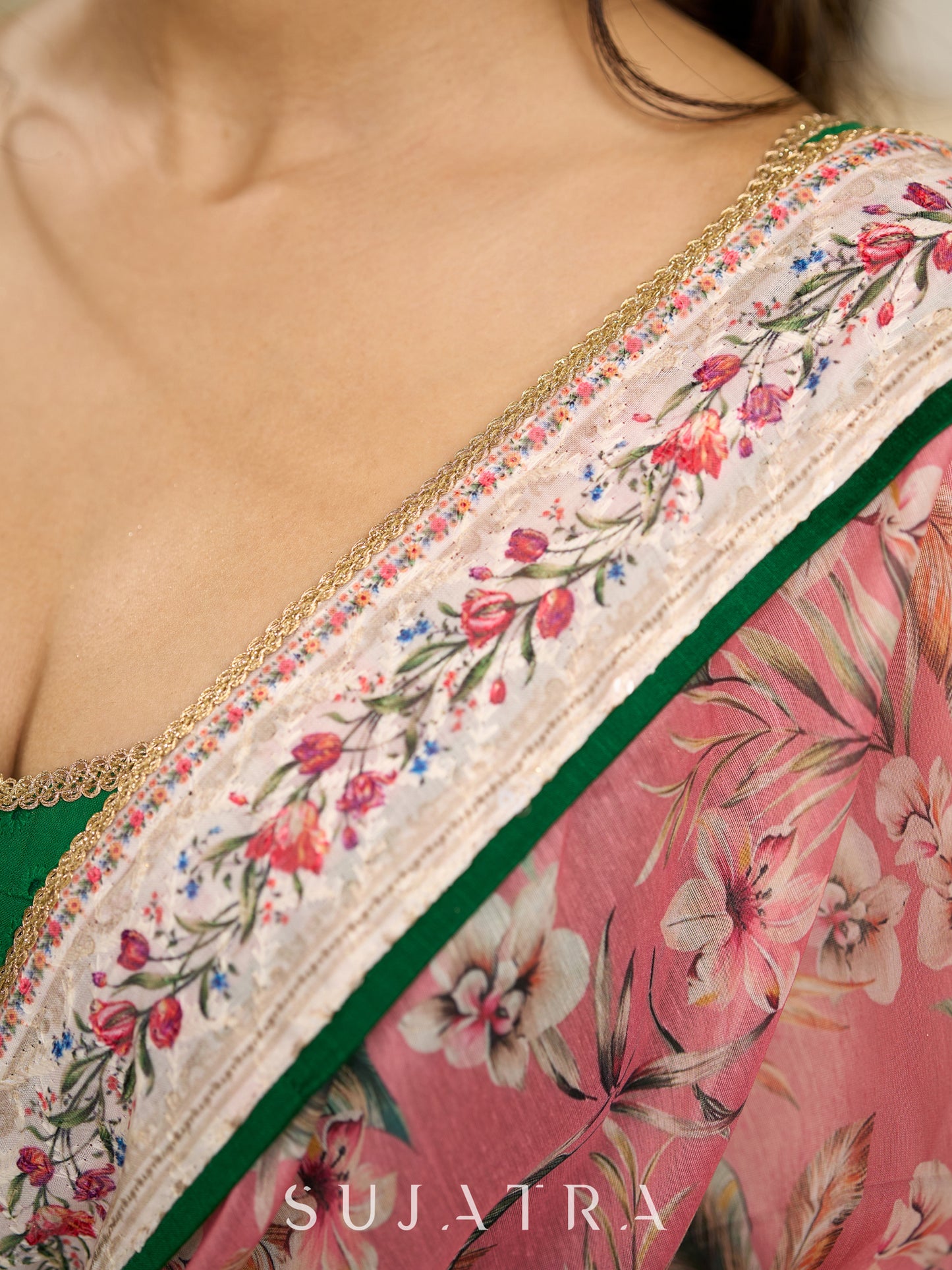 Blush pink floral fantasy chanderi saree draped with embroidered border