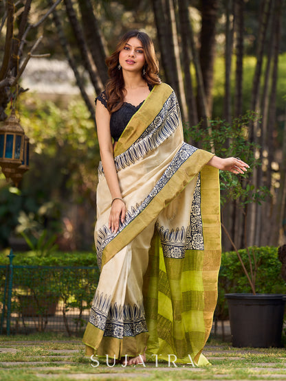 Ivory Handwoven Tussar Silk Saree with Traditional Gold Zari Detailing