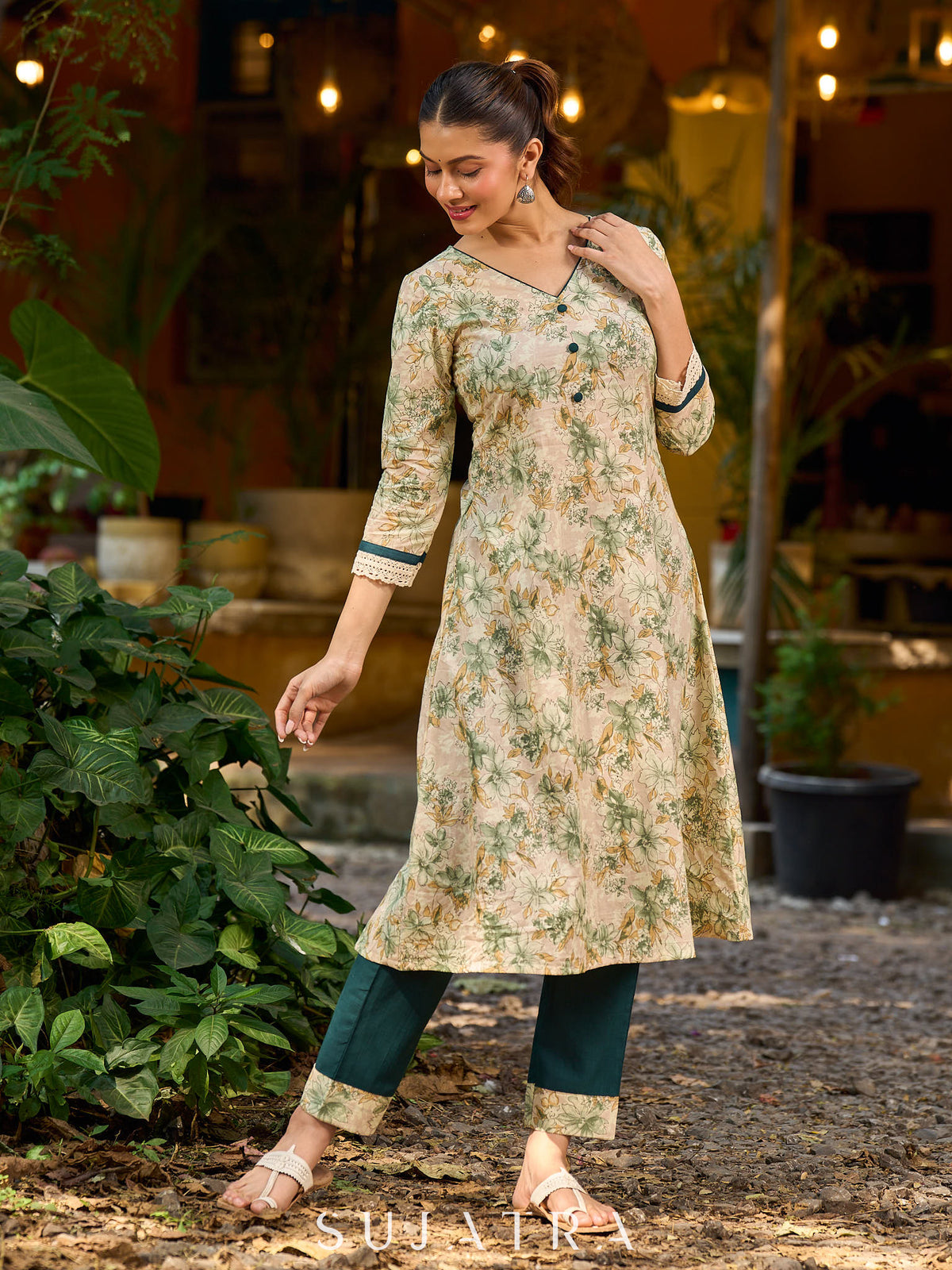 Soft cream delicate floral a line kurta with refined bottle green accents