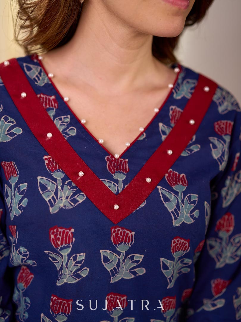 Elegant Navy Blue Tulip Buti Print Cotton Kurta with Pearl Embellished Neckline