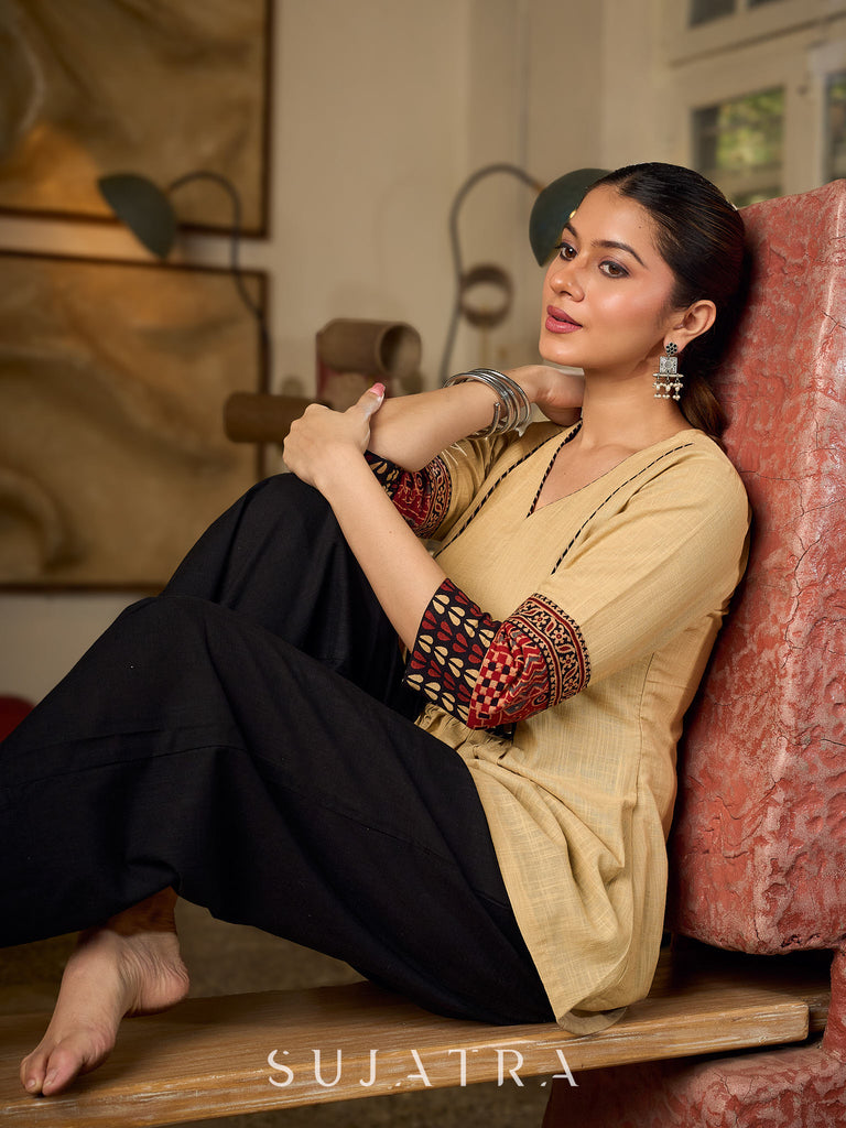Chic Beige Cotton Top Enhanced With Ajrakh Print Sleeves & Embellished Kutch Mirror Work Yoke