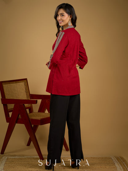 Elegant maroon cotton top highlighted with beautiful border detailing.
