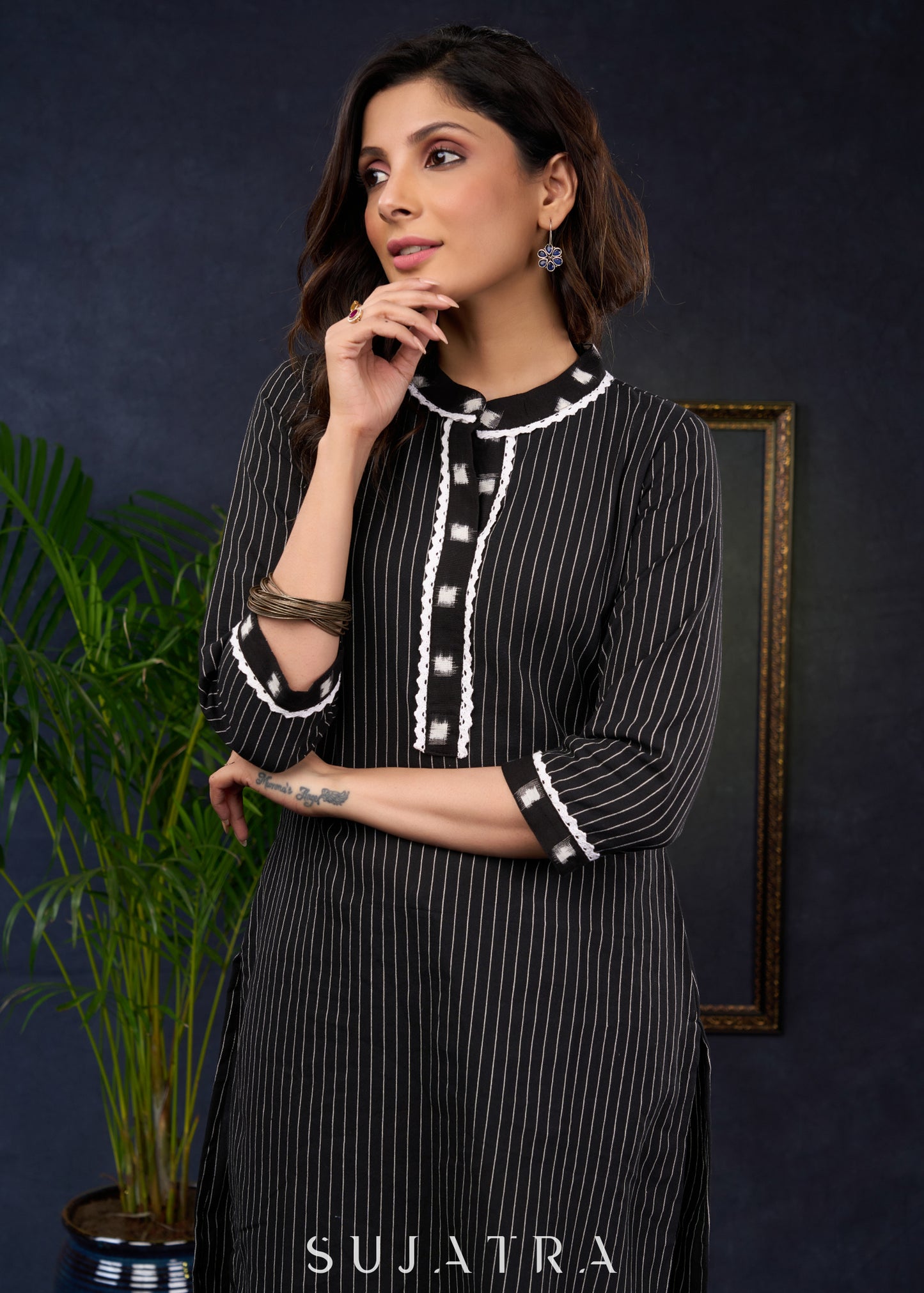 Black Cotton Ikat Collared Kurta With A Stylish And Comfortable Ethnic Look.