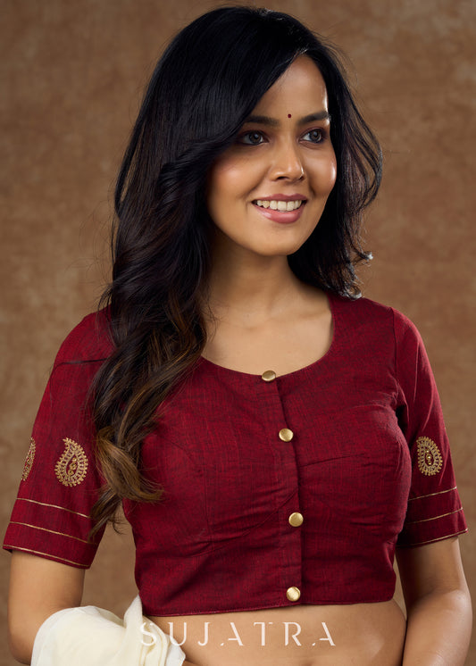 Real elegance : Maroon cotton blouse featuring intricate paisley embroidery perfect for making a sophisticated statement