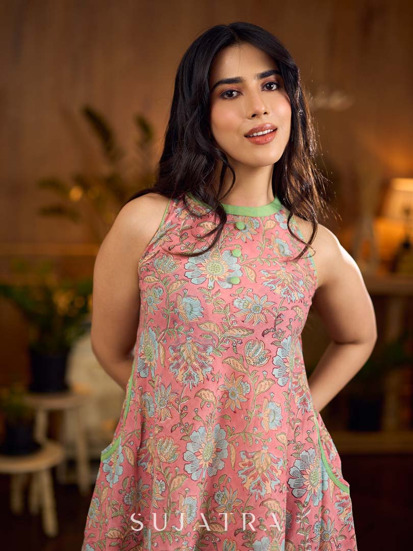 Soft peachy pink floral halter-neck dress with fresh green accents, cr –  Sujatra