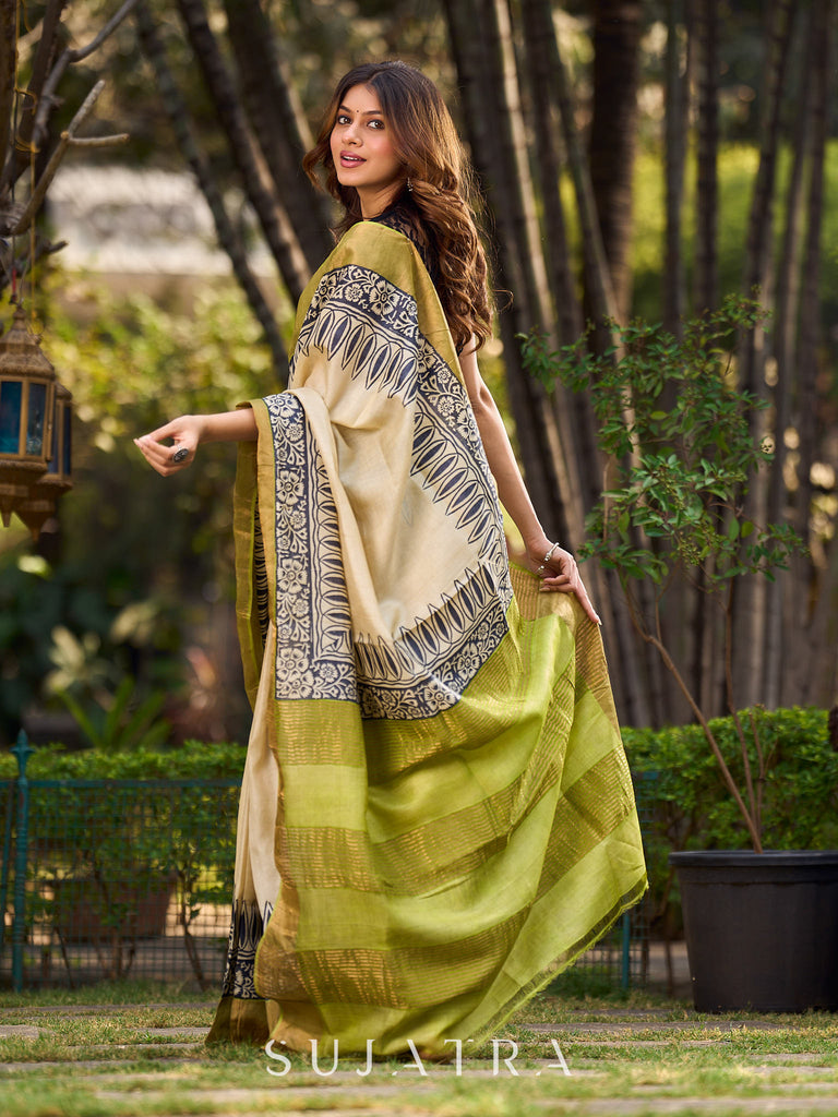 Off-White Handwoven Pure Tussar Silk Block Printed Saree with Traditional Green and Gold Zari Detailing