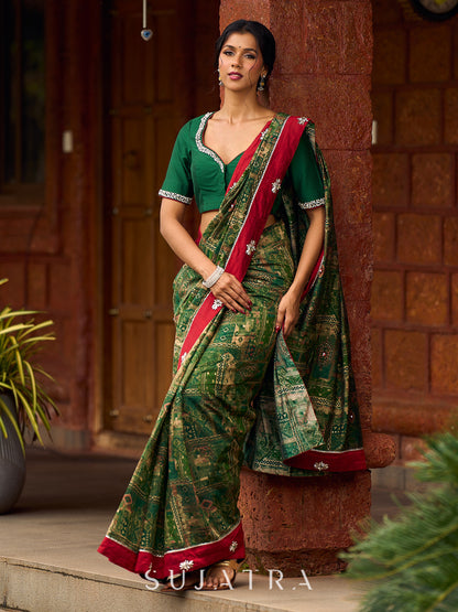 Sophisticated Dark Green Viscose Printed Saree with Diamond-Studded Border & Pallu
